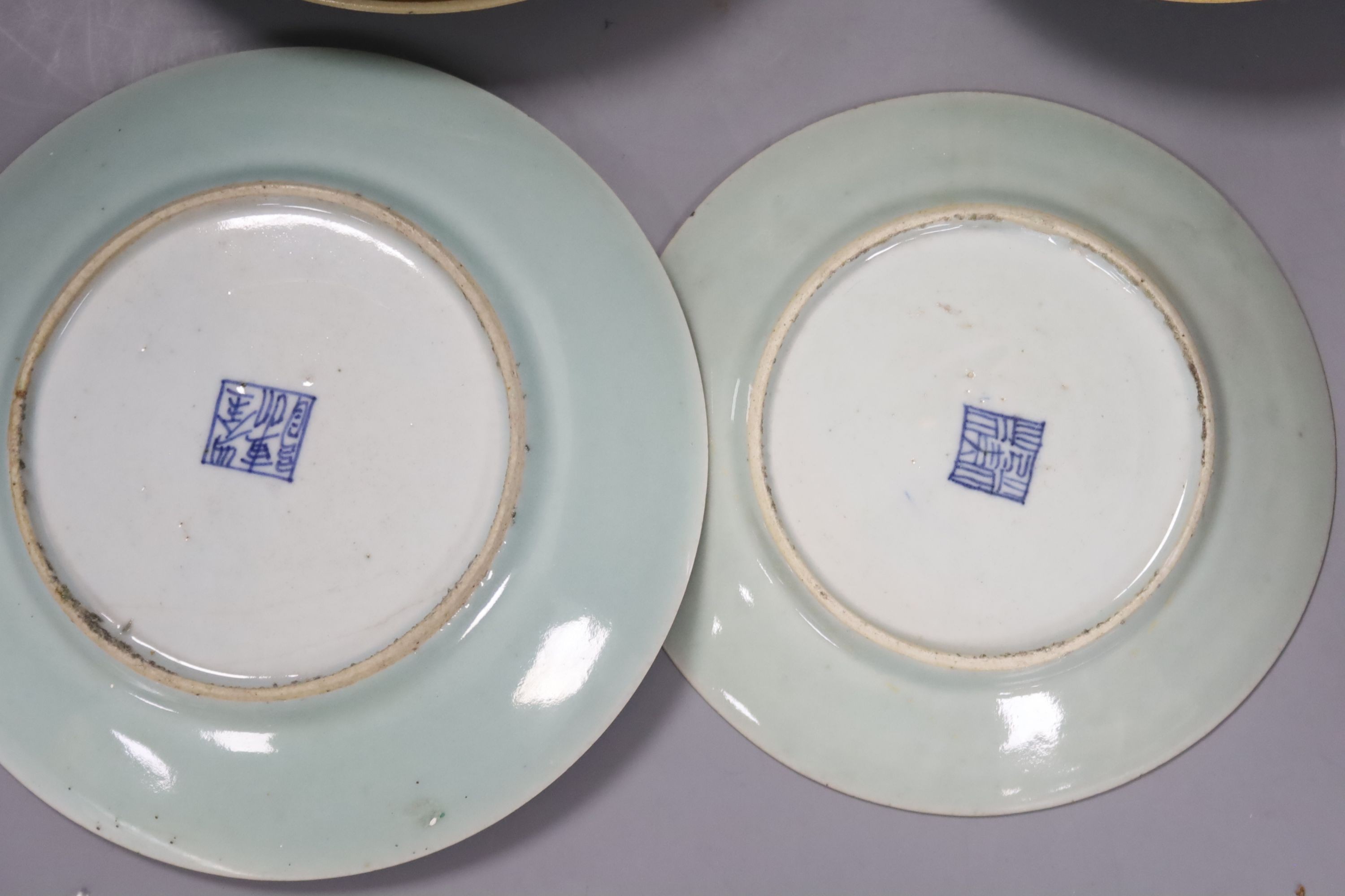 Eleven Chinese celadon ground famille rose plates, mid 19th century 22cm